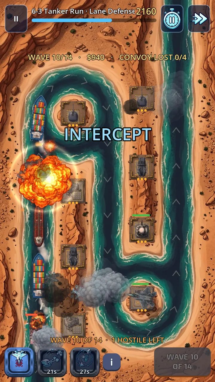 Tankers in a desert channel while towers intercept attackers